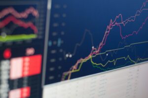 Business analytics dashboard comparing payment processing pricing models on a screen