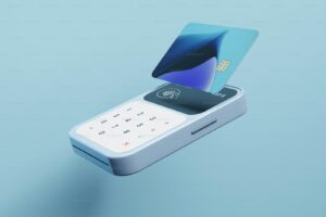 a cell phone with a credit card sticking out of it