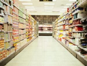a grocery store aisle filled with lots of food