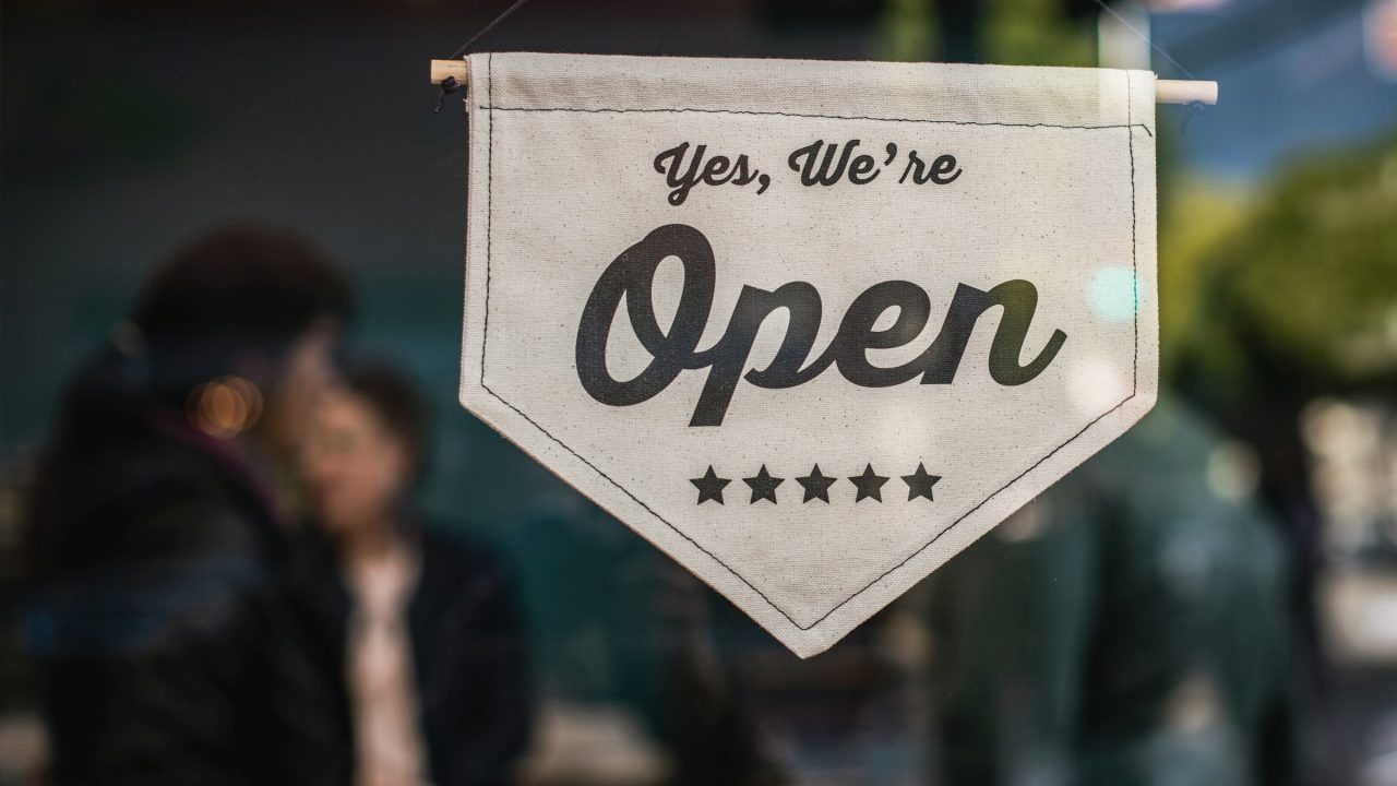 Small business open sign representing local Katy Texas merchant ready to accept payments