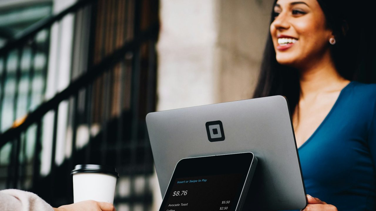 Merchant accepting card payment at point-of-sale terminal